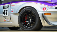 Load image into Gallery viewer, Mazda Miata Full Racecar Jongbloed Racing Wheels 15x11.0 Flow Formed S500 4x100 Spec Miata in All Satin Black Front Wheel Rim Close Angled Shot