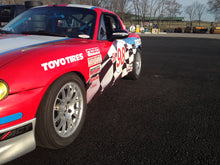 Load image into Gallery viewer, Jongbloed Racing Wheels Spec Miata Wheels in 15x7.0 4x100 25mm Offset in Silver on Red Track Racecar NASA SCCA